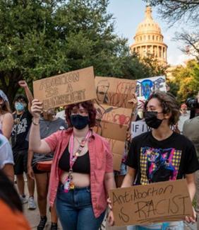 Pro-choice protesters march outside the Texas State Capitol