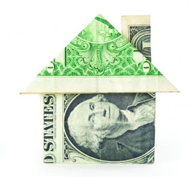 dollar bill folded into a house